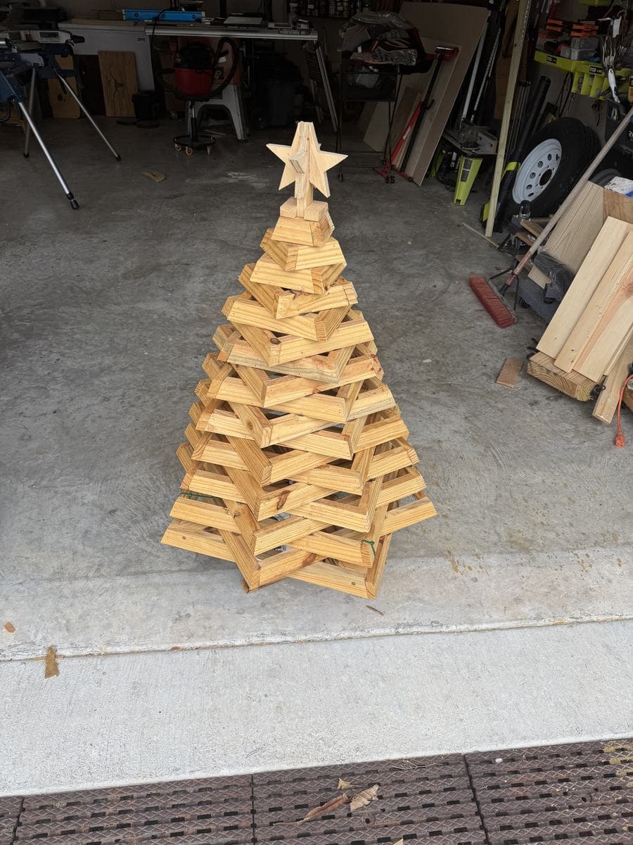 Stacked wooden Christmas tree with star topper