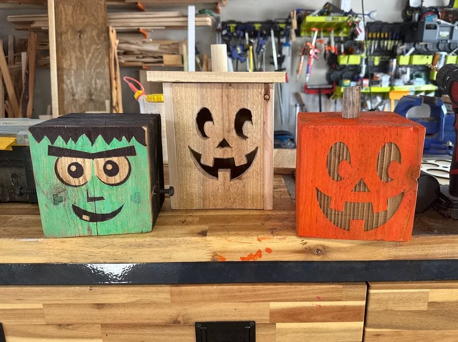 Carved jack-o-lantern and Frankenstein wood blocks