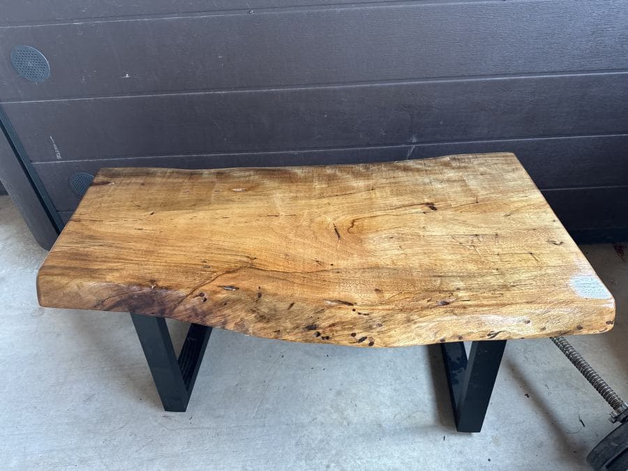 Finished live-edge bench on steel legs