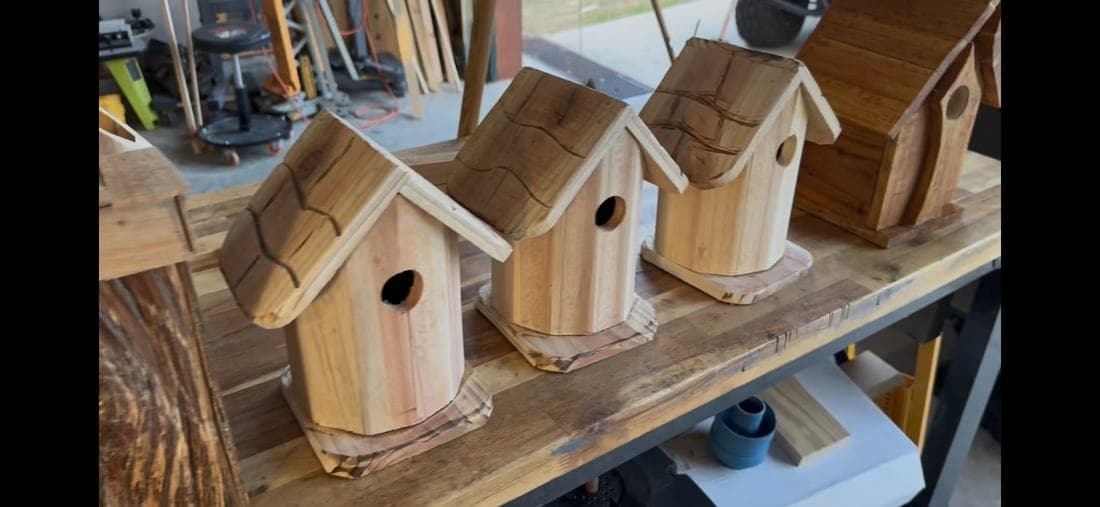 A production run of cedar birdhouses on the workbench